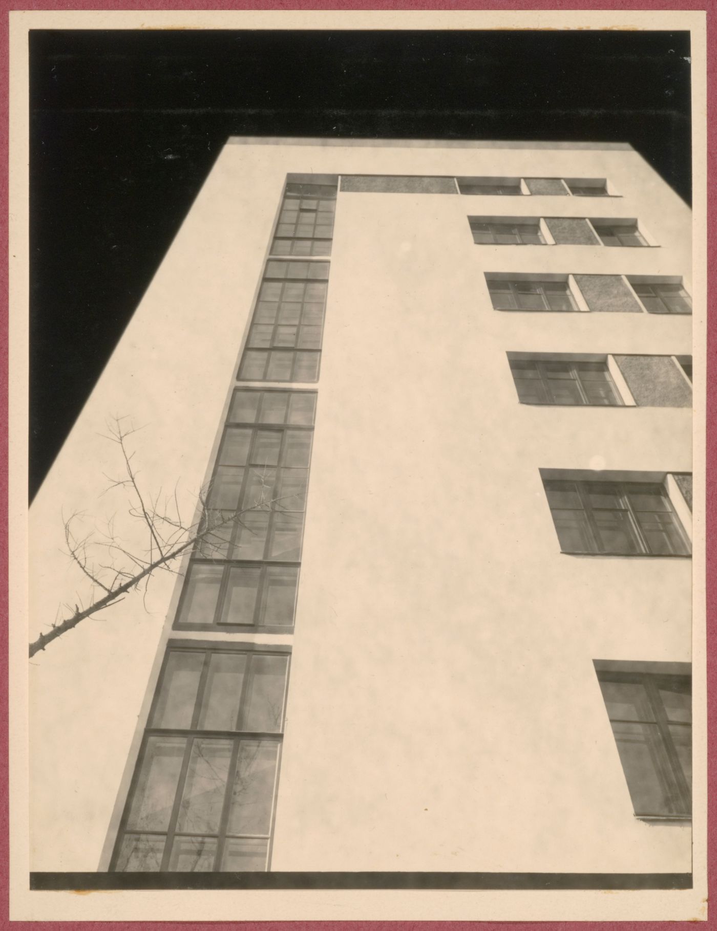Partial exterior view of the Dukstroi Apartment Building showing windows from below, 34 Leningradskoe Shosse, Moscow