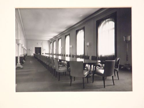 Interior of very long conference room, with very long table