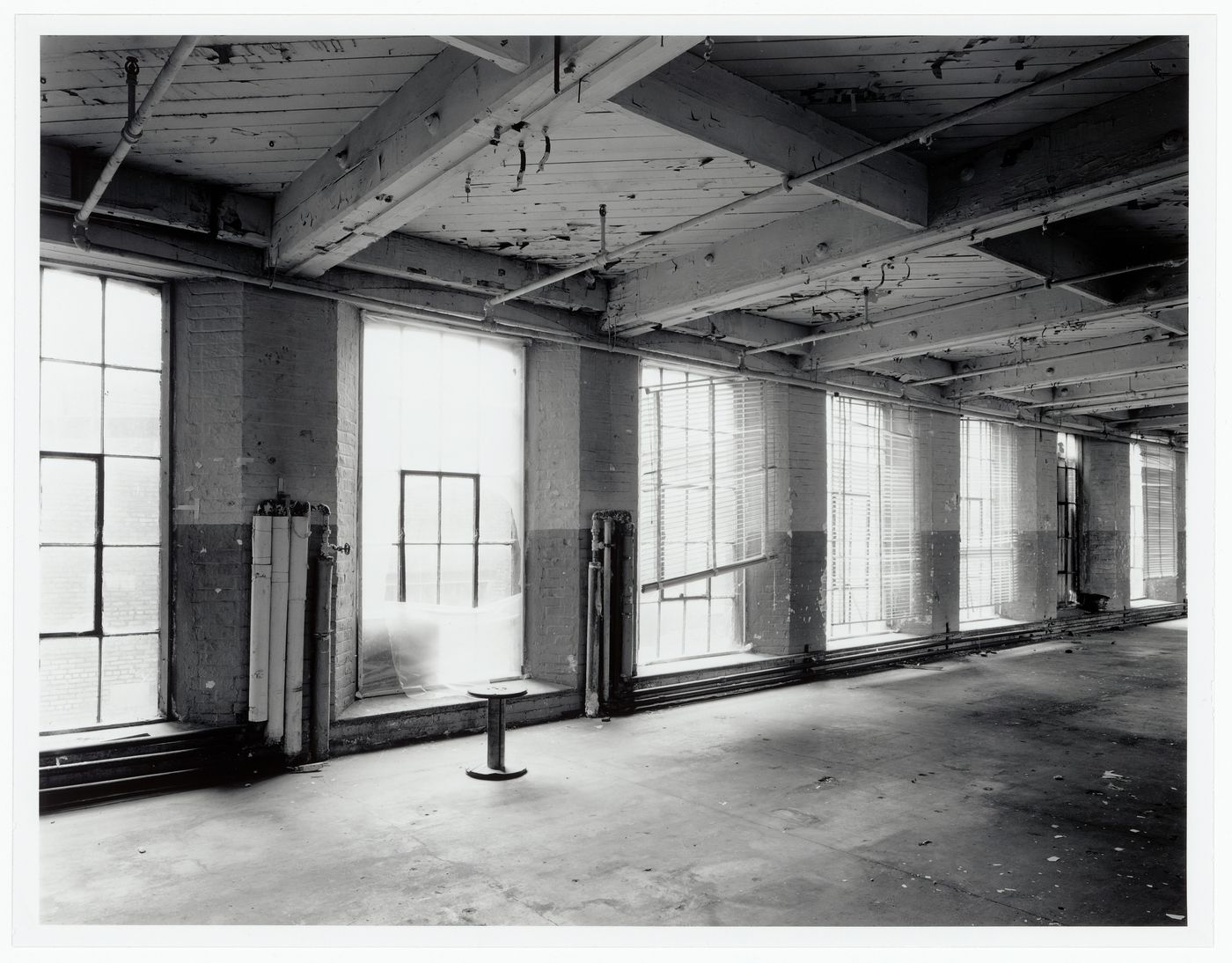 Interior view of the Belding Corticelli Spinning Mill showing spools in the first floor workshops, Montréal, Québec