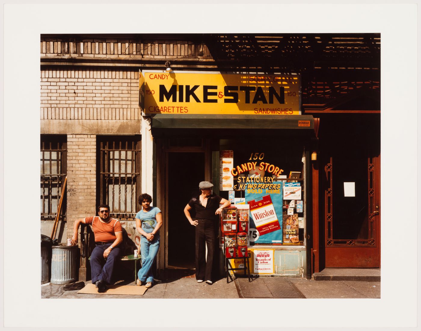East 2nd Street, three men outside MIKE & STAN stationery store, New York City, New York