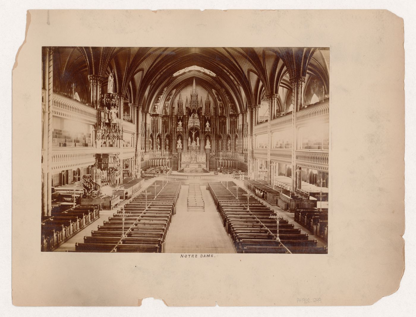 Interior view of Basilique Notre-Dame showing the nave, tribunes, and sanctuary, Place d'Armes, Montréal, Québec