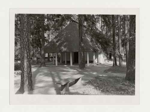 View of the principal façade of Woodland Chapel showing the portico, walkway and surrounding forest, Woodland Cemetery, Stockholm