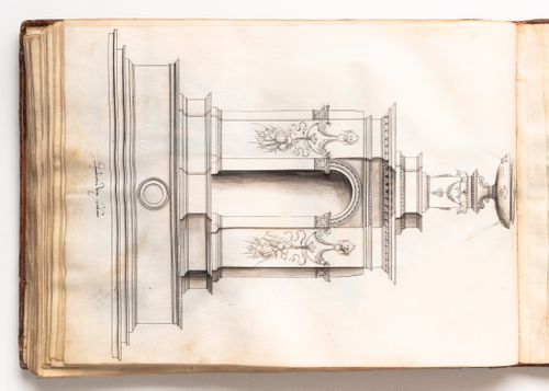 Elevation for a square fountain with niche decorated with masks, festoons, and vegetables