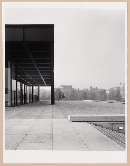 Partial view of a façade of the Exhibition Pavilion showing a square and the sculpture "Tetes et Queue" [Heads and Tails], New National Gallery, Berlin, Germany