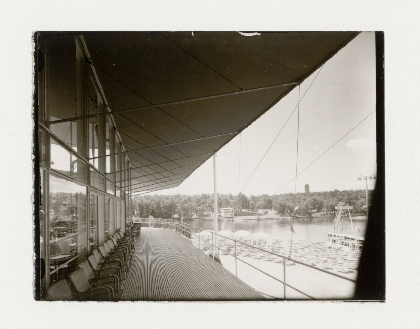 Exterior view of the balcony of Paradise Restaurant at the Stockholm Exhibition of 1930 with the Green Point Café and the Aquarium in the distance, Stockholm