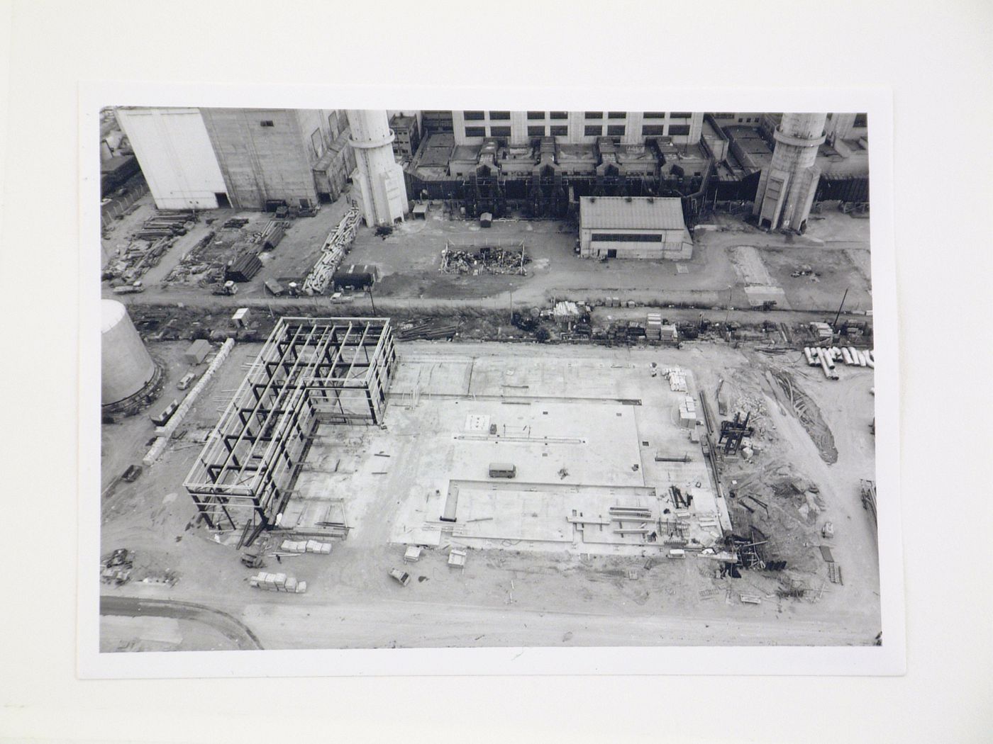View of foundation and construction of steel structure for power station, from above, United Kingdom