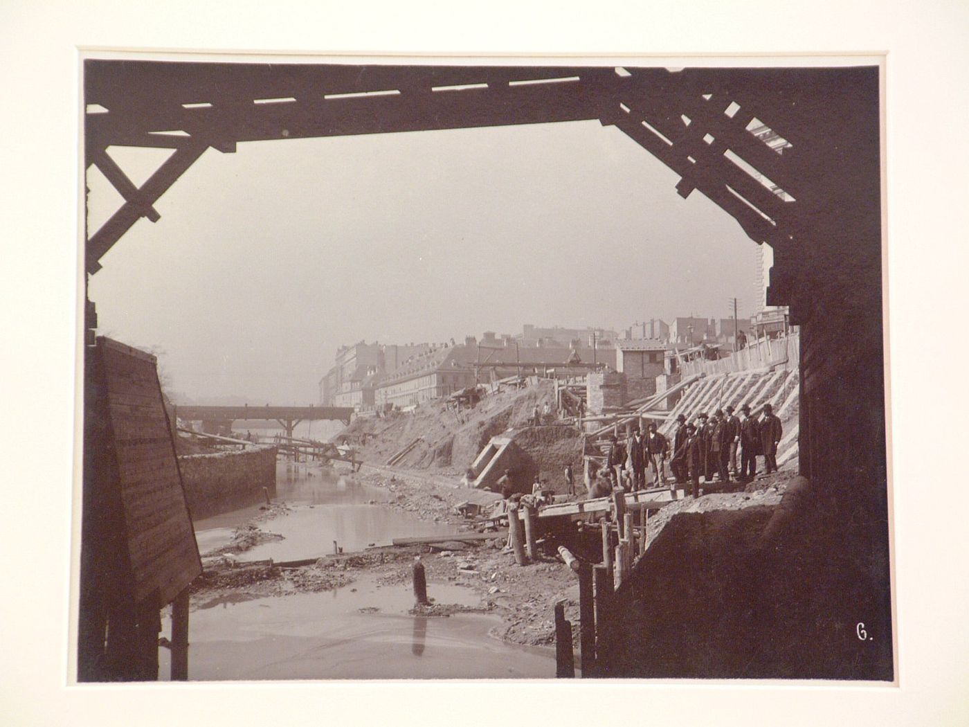 View of construction on river, seen from within framework of scaffolding, Vienna, Austria