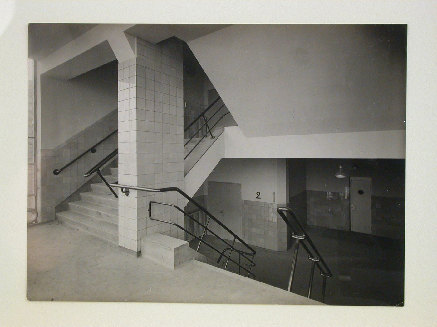 Interior view of an unidentified stairwell with tiled walls, Netherlands