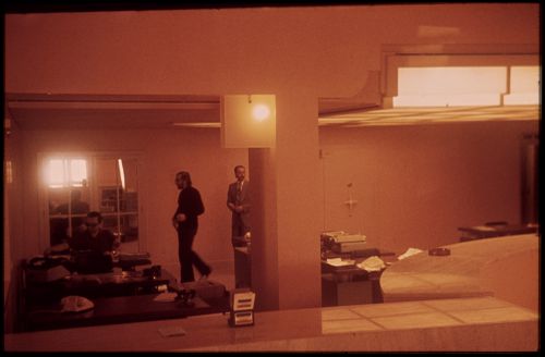 View of three men and interior of Banco Pinto & Sotto Mayor, agência e clube, Lamego, Portugal