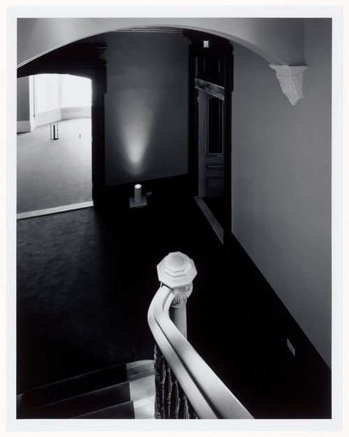 Interior view looking down the original carved wooden stairs, Shaughnessy House under renovation, Montréal, Québec