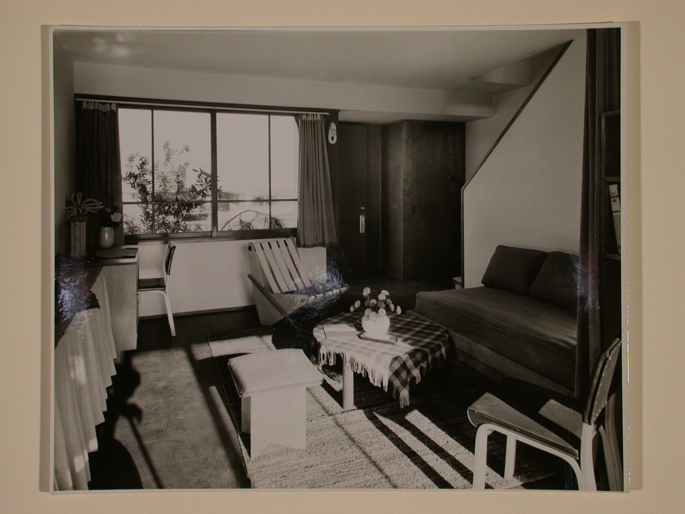 Interior view of a furnished living room in a two storey duplex