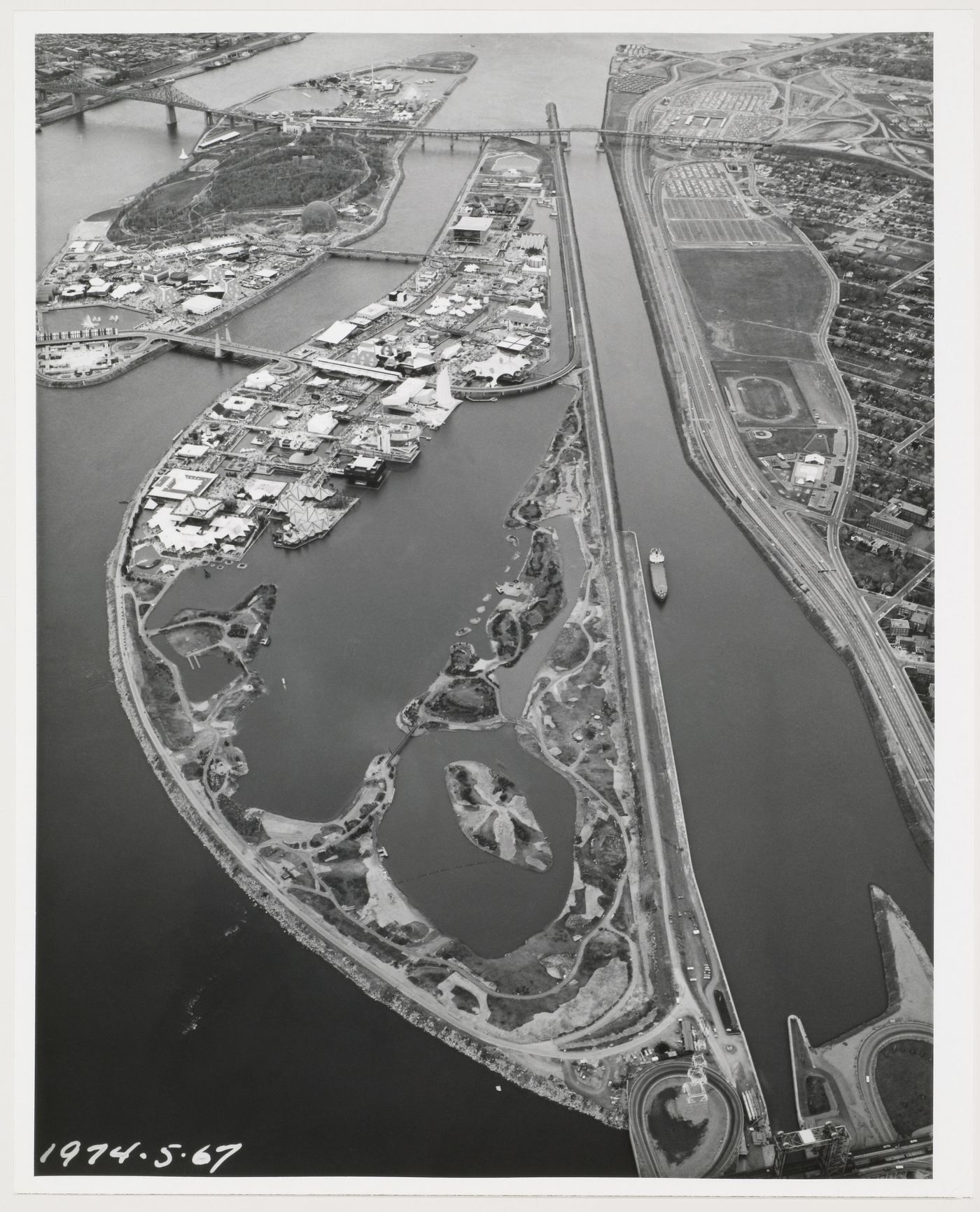 Aerial view of the Île Notre-Dame and Île Sainte-Hélène sites, Expo 67, Montréal, Québec