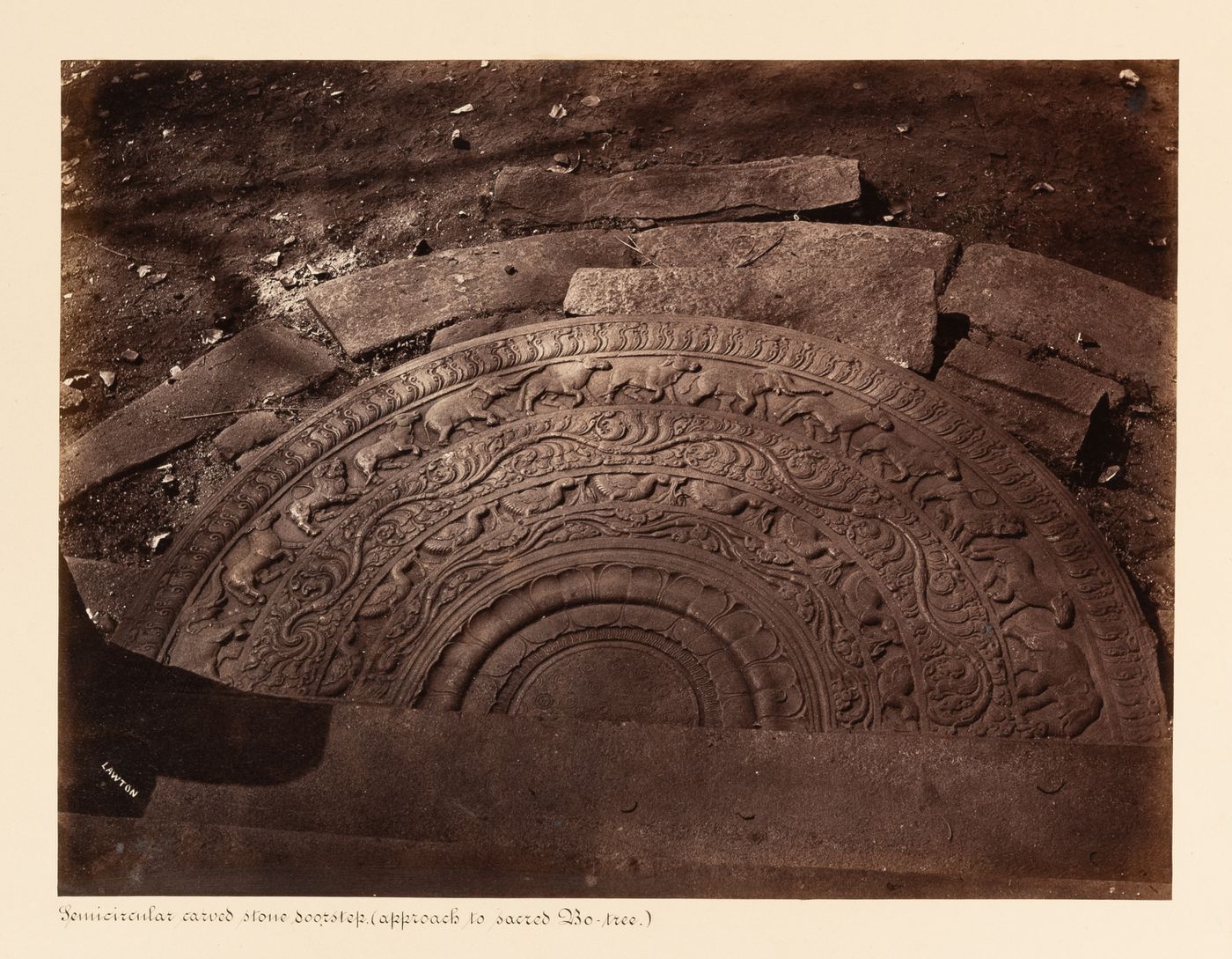 View of a moonstone, Bodhi Tree (also known as the Bo Tree) Enclosure, Anuradhapura, Ceylon (now Sri Lanka)