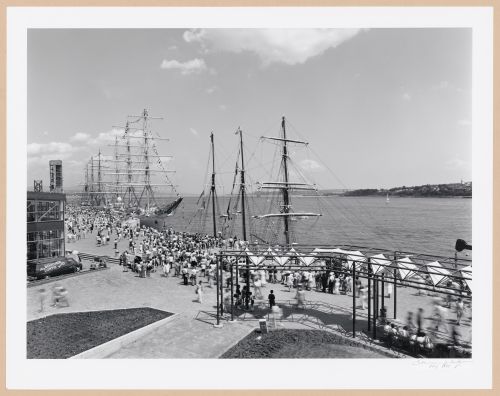 View of Pointe-à-Carcy walkway and moored sailing ships with the Saint Lawrence River in the background, Port of Québec, Québec