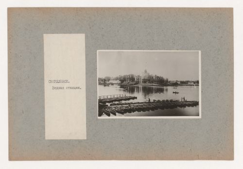 View of the Dinamo water sports station from across the pond showing boats at the pier, Sverdlovsk, Soviet Union (now Ekaterinburg, Russia)