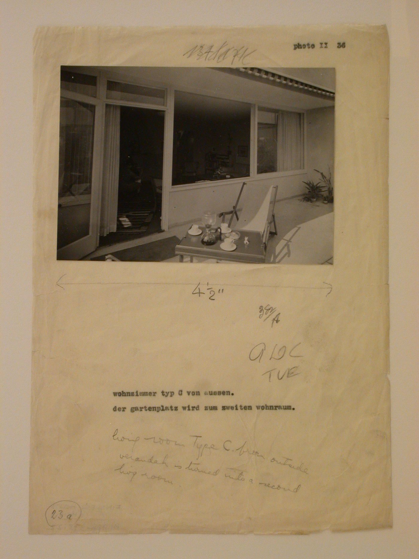 View of the south façade of a Type C row house showing the living room through a window and an open glass door, Werkbundsiedlung Neubühl, Zurich, Switzerland