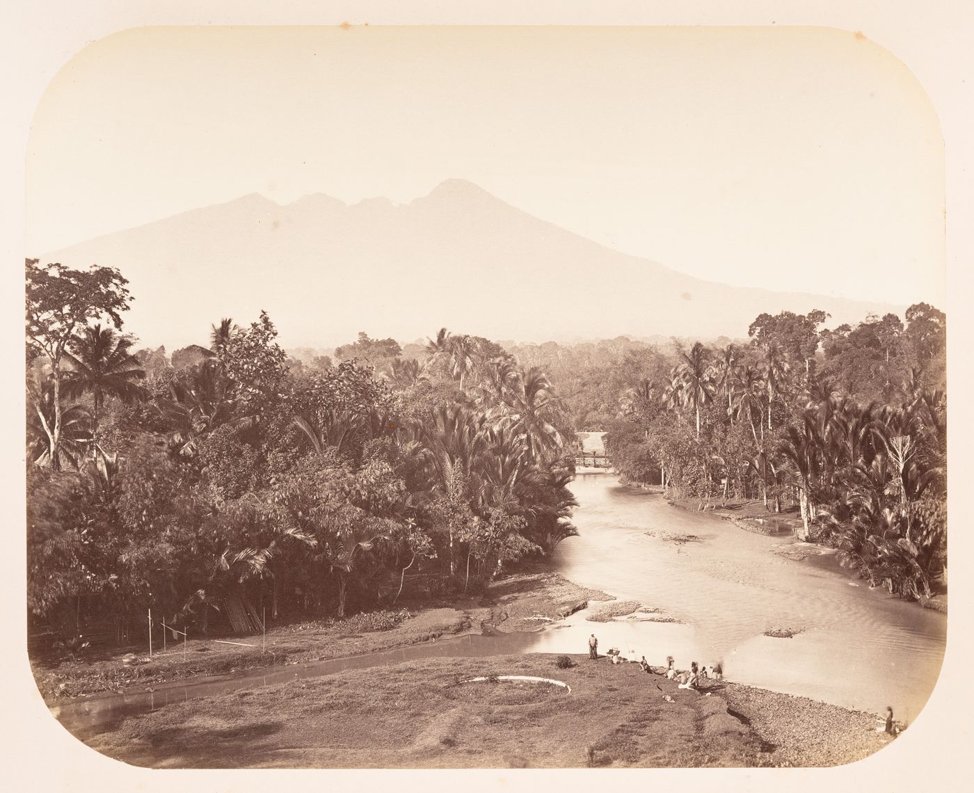 View of Mount Gede (also known as Gunung Gede) and a river, near Buitenzorg (now Bogor), Dutch East Indies (now Indonesia)