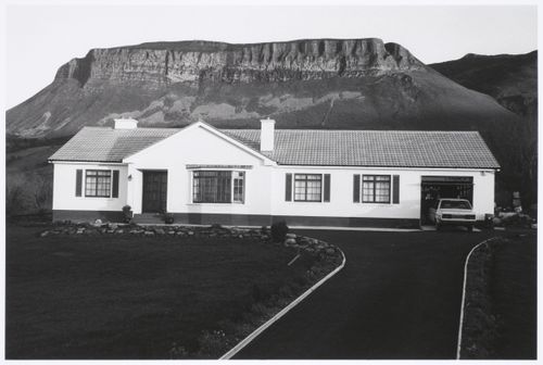 Bungalow in front of rock formation, Glencar, County Sligo, Ireland