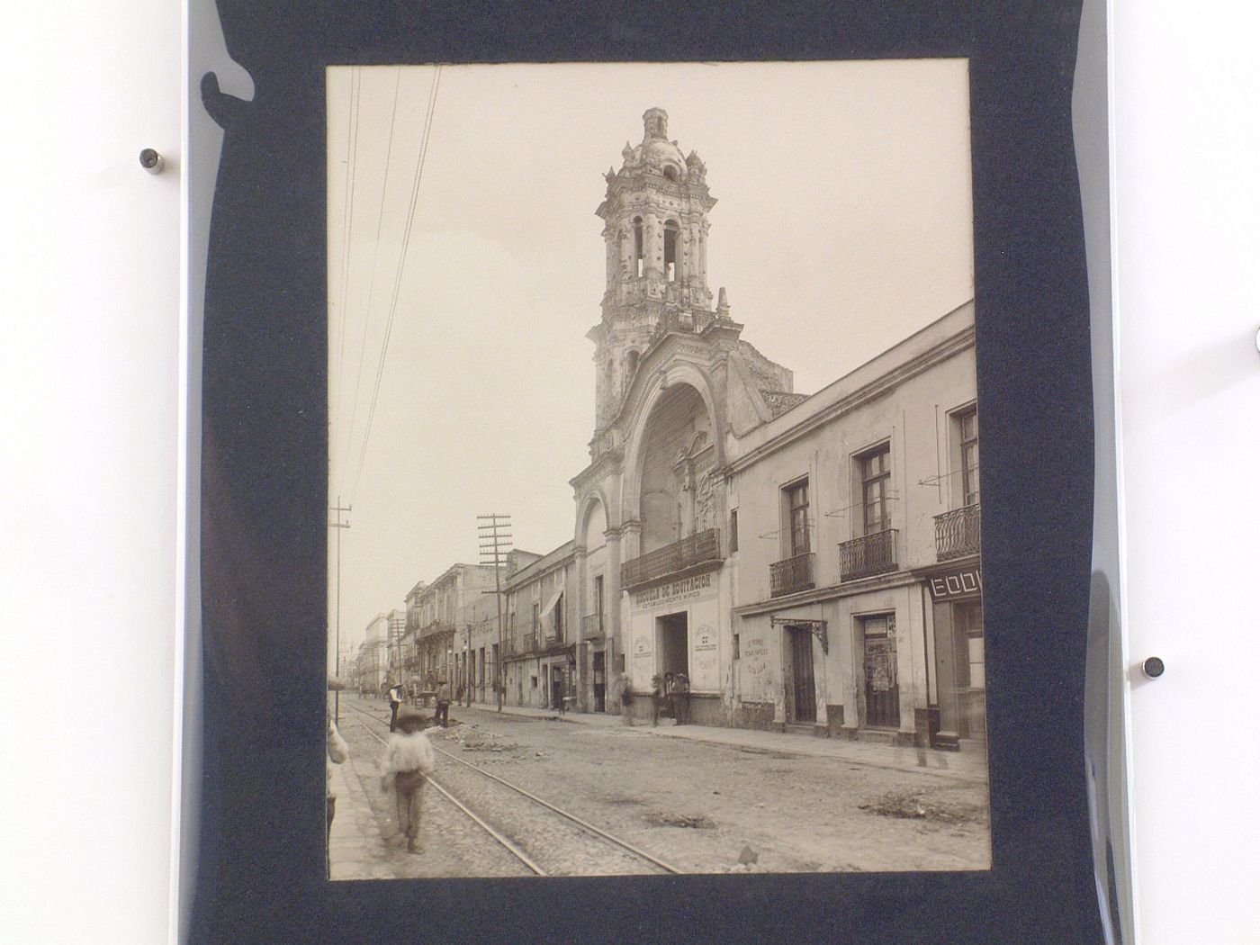 View of the Church of San Felipe Neri showing the Calle de San Felipe Neri (now Avenida República del Salvador) and people, Mexico City, Mexico
