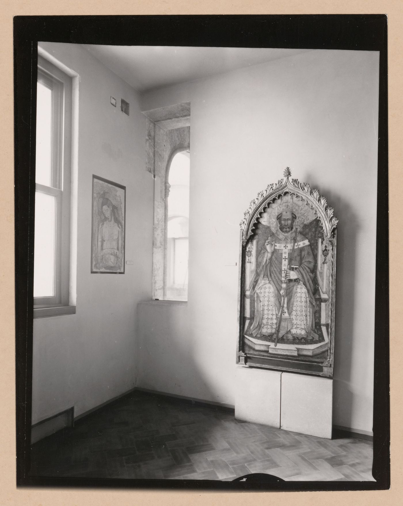 Interior view of the corner of a gallery showing two paintings, Palazzo Abatellis, Galleria regionale della Sicilia, Palermo, Italy