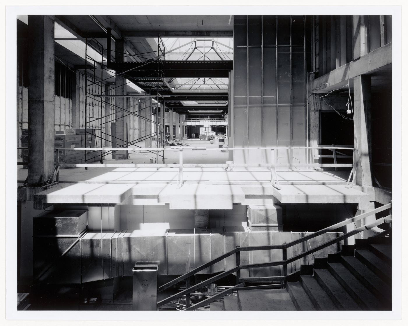 Interior view of main exhibition galleries from across the Entrance Court, Canadian Centre for Architecture under construction, Montréal, Québec