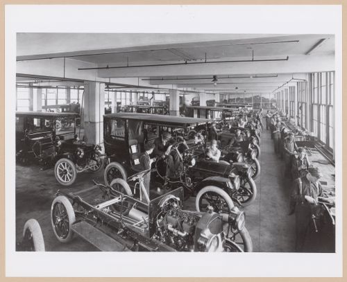 Interior view of Assembly Building No. 10 showing workers assembling automobiles, Packard Motor Car Company Assembly Plant (now abandoned), East Grand Boulevard, Detroit, Michigan