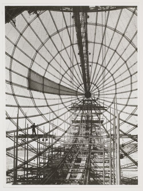 View of a zeppelin under construction, looking towards the helm from inside the structure
