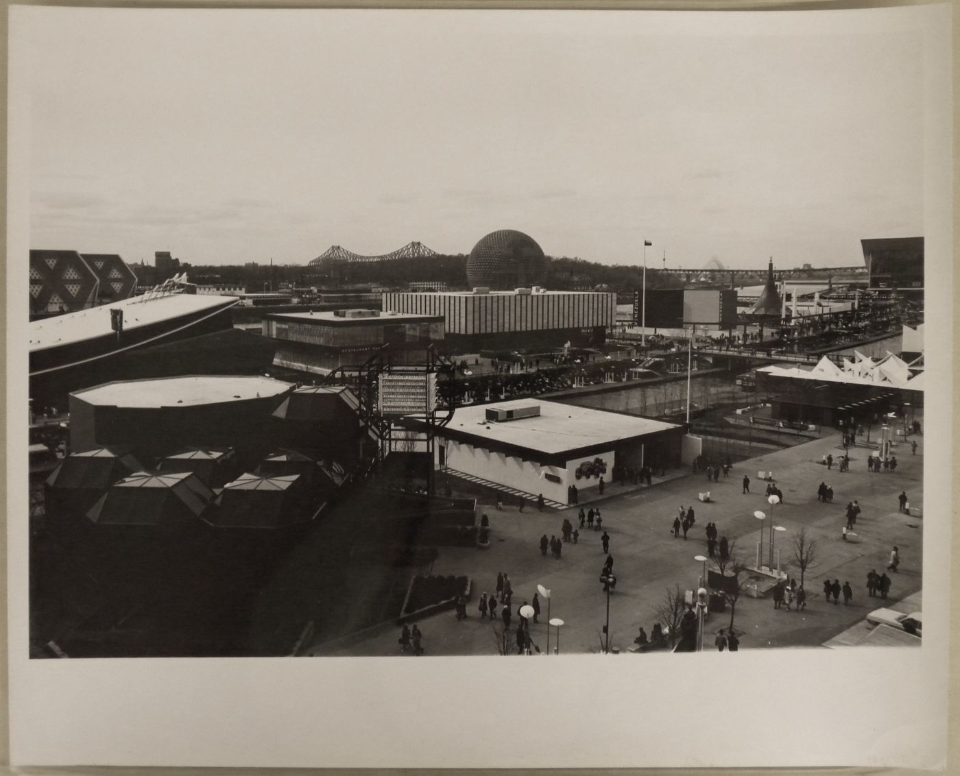 Partial view of a walkway and a waterway on the Île Notre-Dame site, Expo 67, Montréal, Québec