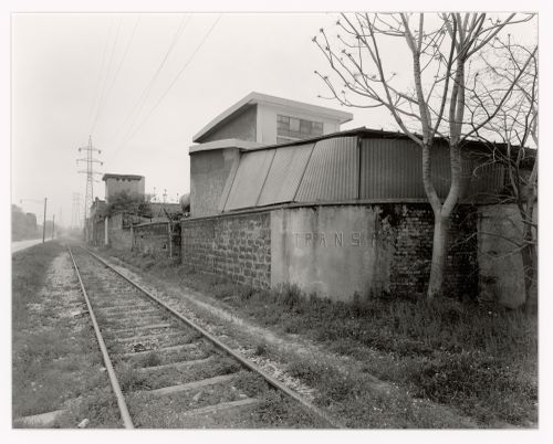 View of rails and buildings, via dell'elettricità, Marghera, Italy