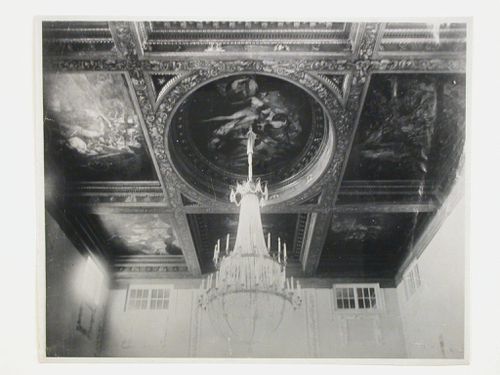 Interior view of the Tarasov Mansion showing a decorated compartment ceiling and a chandelier, Moscow