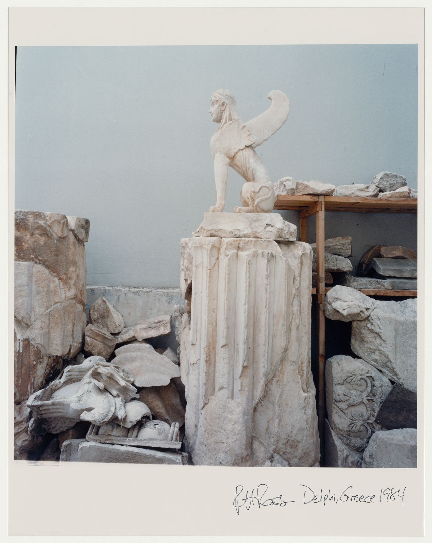 Close-ups of stone fragments in the Museum of Delphi, sphinx on column, Delphi, Greece