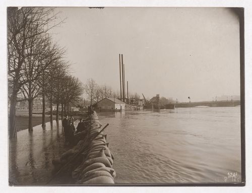 Construction of the Paris Metro, exterior view of sandbags lining the flooded riverbanks of the Seine, Paris, France