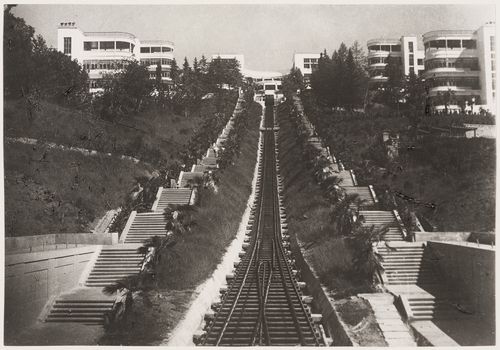 Exterior view of funicular railway tracks flanked by flights of stairs leading to Voroshilov Sanatorium, Sochi, Soviet Union (now in Russia)