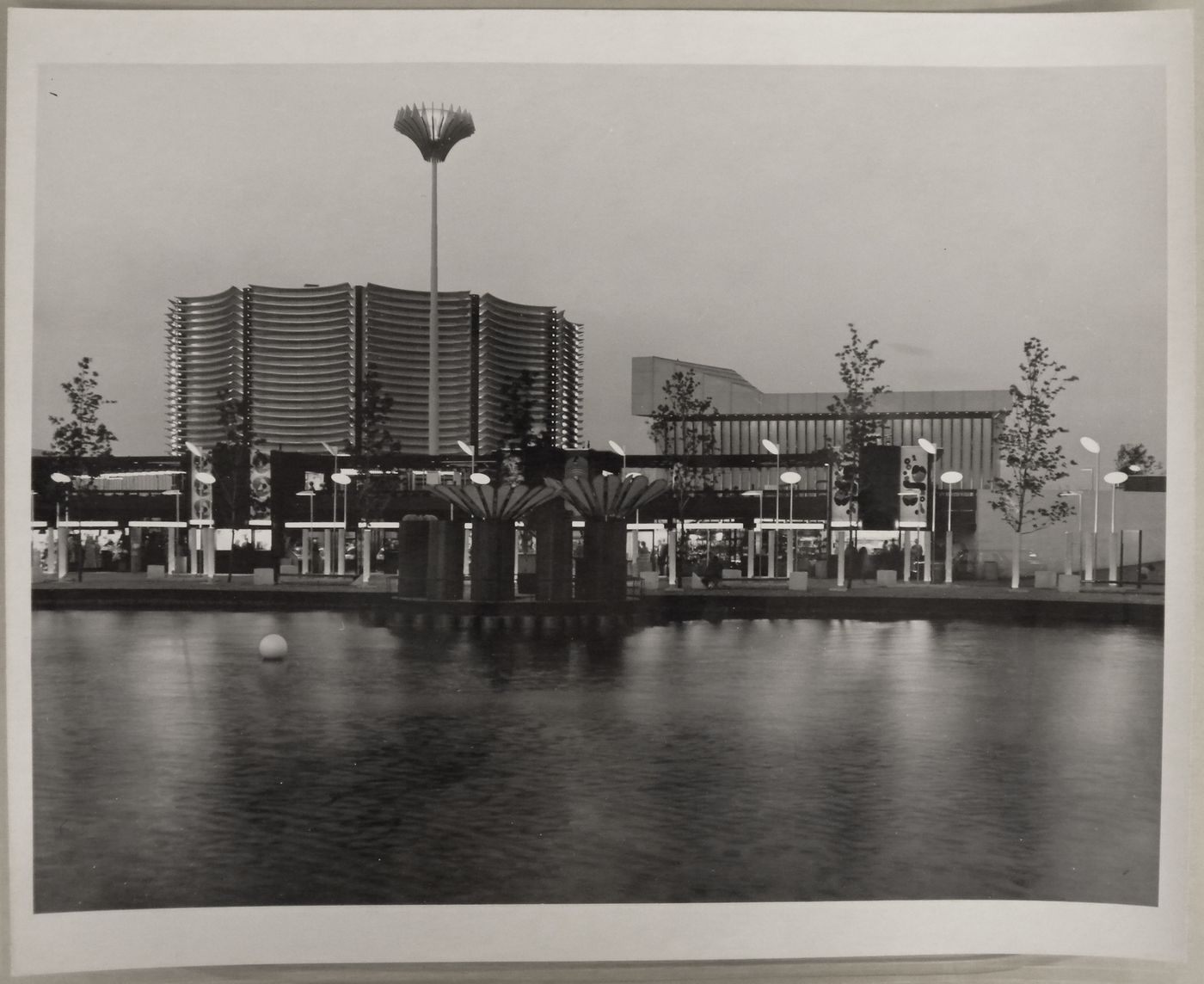 View of the exterior lighting designed by Luis F. Villa at the Expo-Services C next to the Canadian Pacific-Cominco Pavilion, Expo 67, Montréal, Québec