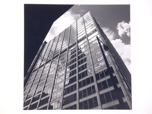 Worm's eye view of the tower façade and corner of the 200 West Monroe Building, Chicago, Illinois, United States