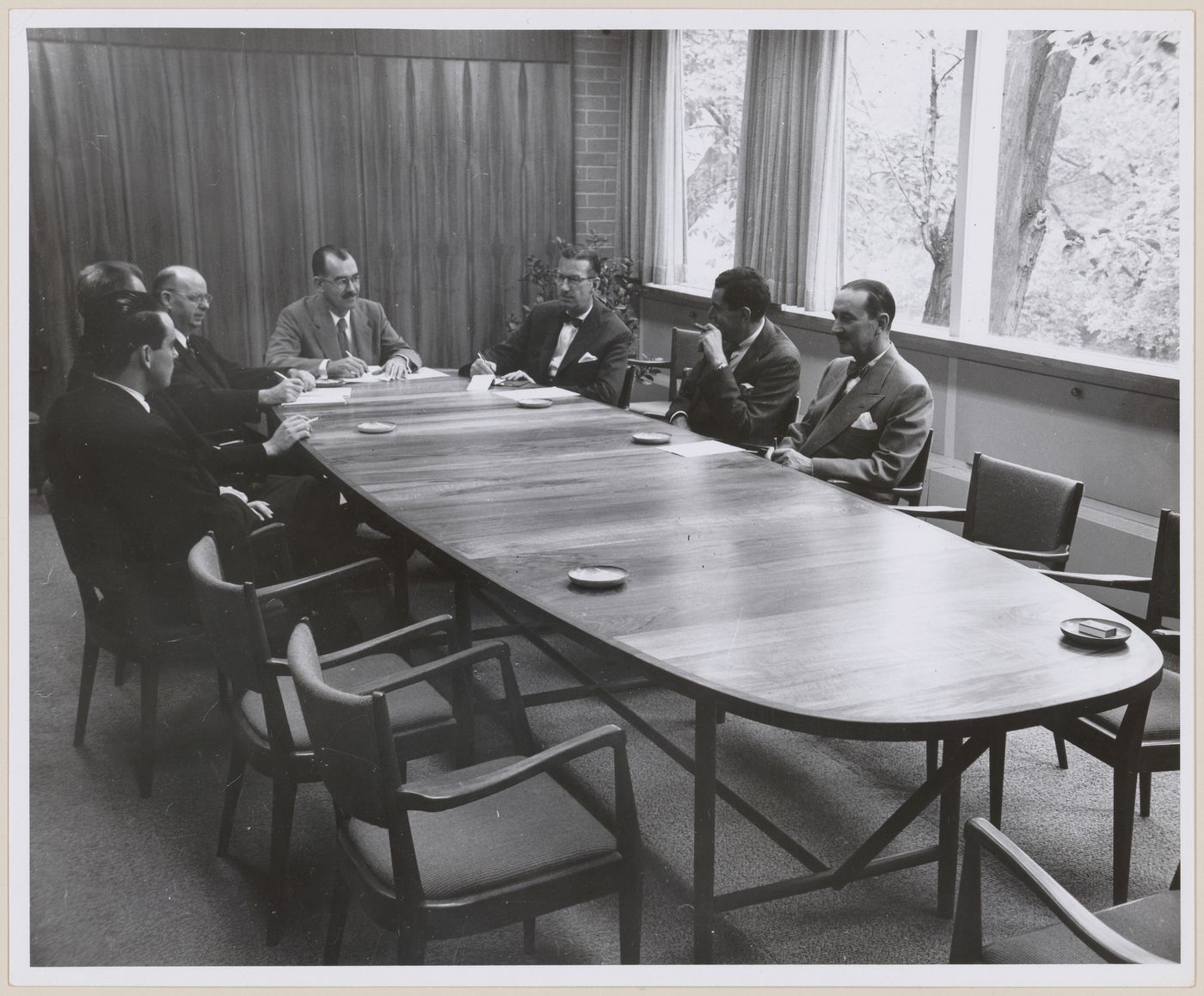 John C. Parkin and colleagues in boardroom meeting at John B. Parkin Associates Office at 1500 Don Mills Road