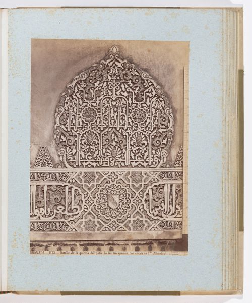 Close-up view of arabesques and calligraphy in Court of the Mrytles, Alhambra, Granada, Spain
