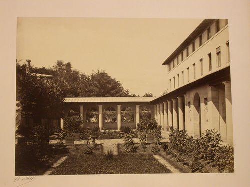 Communauté des Soeurs (convent), la maison de santé (clinic), view of columned building with connected enclosed walkway, Charenton, France
