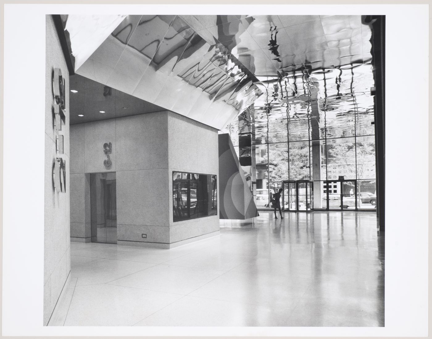 Interior view of the entrance doors and elevator bays of the 200 West Monroe Building, Chicago, Illinois, United States