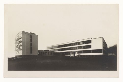 Exterior view of the Bauhaus building showing the studio wing, auditorium, cafeteria, and administration wing, Dessau, Germany