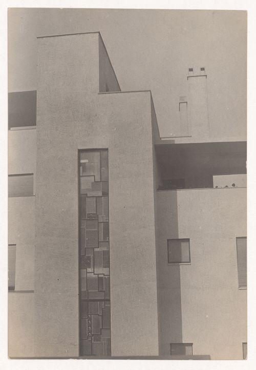 Partial view from below of top floors of the exterior of the Reifenberg hôtel particulier, showing the stained glass window, Mallet-Stevens road in the 16th arrondissement, Paris, France