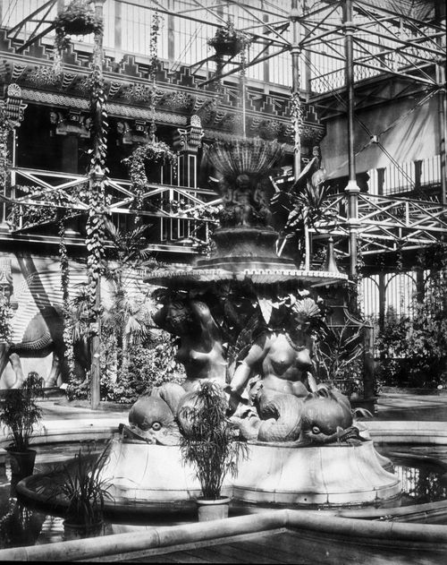 View of fountain in tropical basin, showing the Nineveh Court, Crystal Palace, London, England