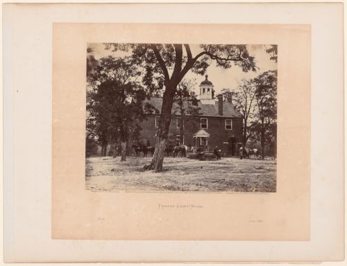 View of the Fairfax County Courthouse with soldiers on horseback in the foreground, Fairfax, Virginia, United States