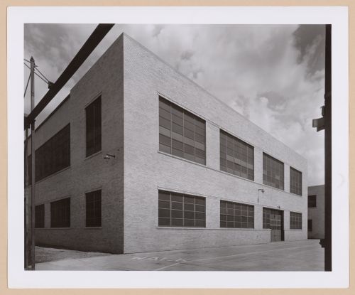 View of the rear [?] façade of the Engineering Garage (also known as Building No. 135), Chrysler Corporation Highland Park Plant, Highland Park, Michigan