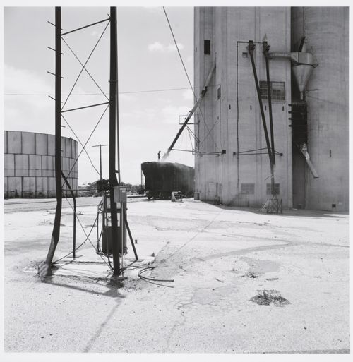 Loading grain at the Goodpasture elevator, Brownfield, Texas 1975
