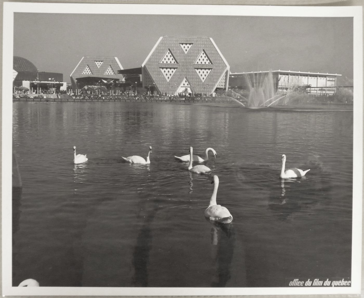 Partial view of the Swan Lake with the Man the Explorer Pavilion in background, Expo 67, Montréal, Québec