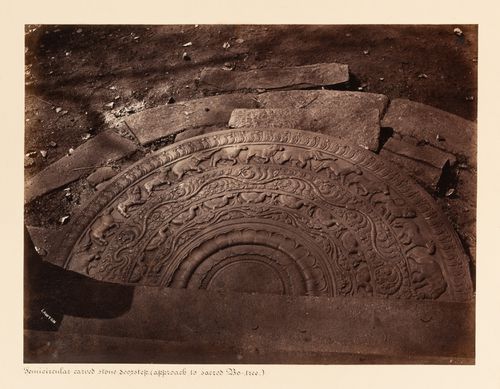 View of a moonstone, Bodhi Tree (also known as the Bo Tree) Enclosure, Anuradhapura, Ceylon (now Sri Lanka)