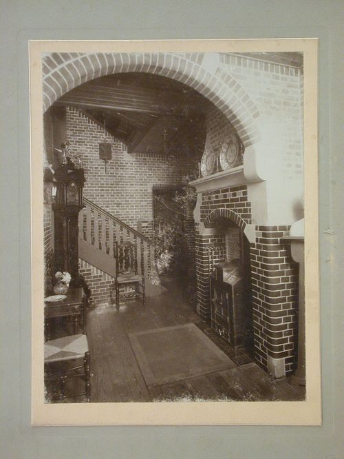 Interior view of the entrance [?] hall of Villa Parkwyck (also known as "The Teapot" or "The House with the Handle") showing a stove and stairs, Van Eeghenstraat 90, Amsterdam, Netherlands