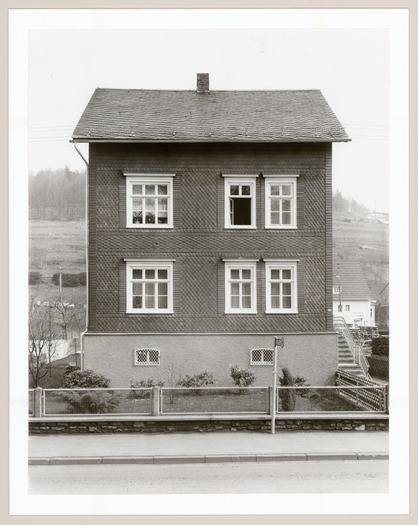 View of the principal façade of the framework house at 65 Eiserntalstraße, Eisern, Germany