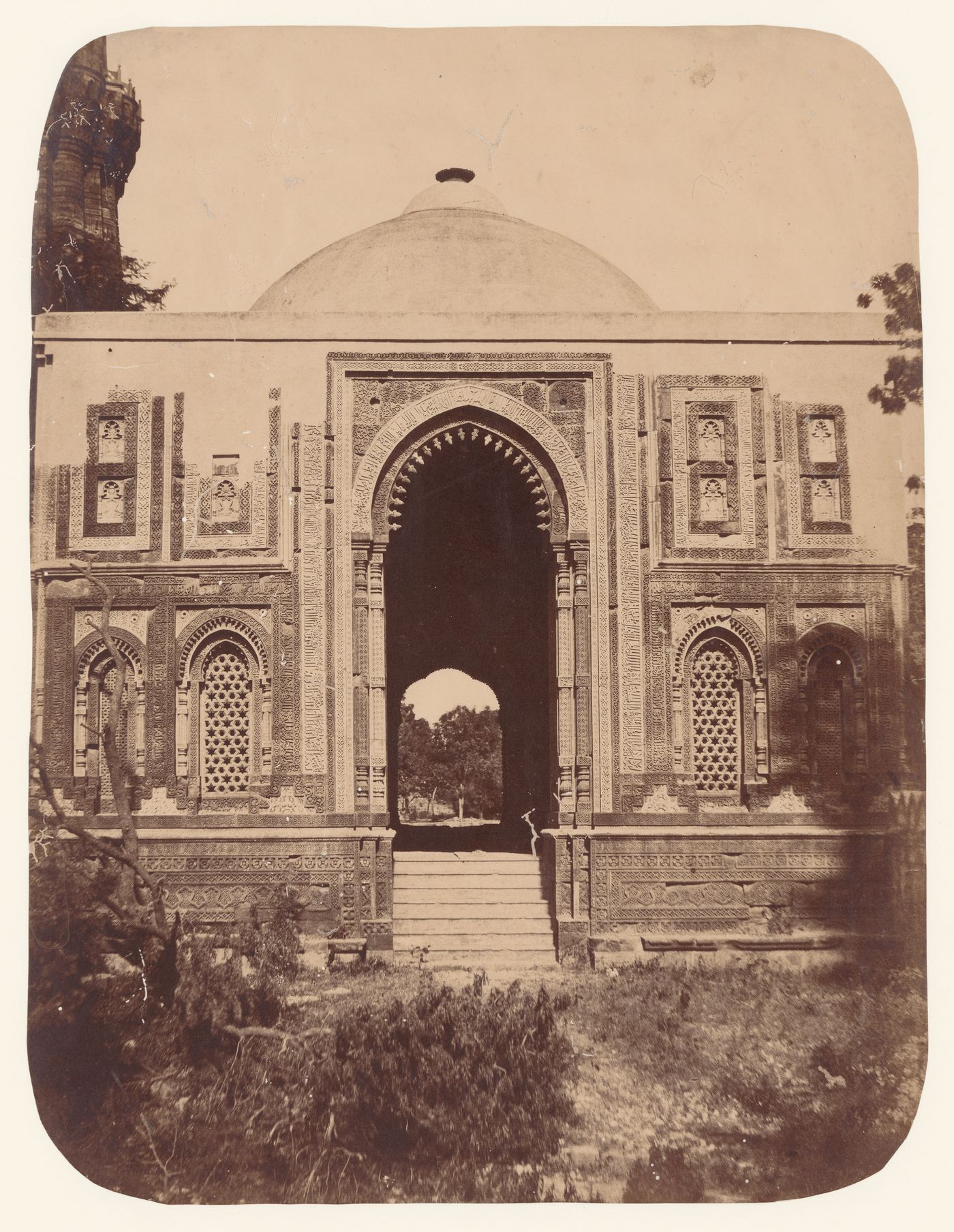 View of the 'Ala'i Darvaza [Lofty Gate] showing the Qutb Minar in the left background, Quwwat al-Islam [Might of Islam] Mosque Complex, Delhi, India